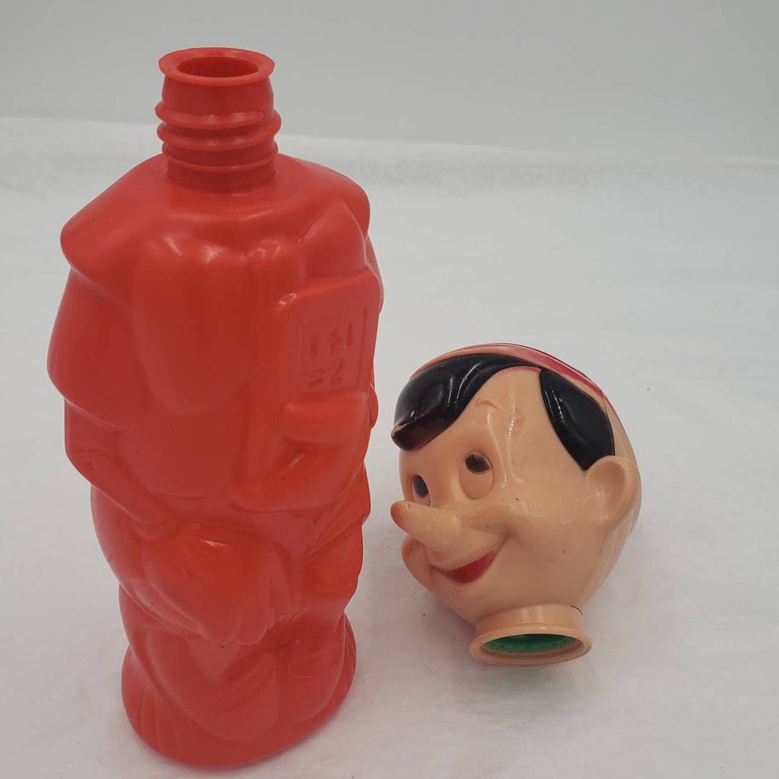 Vintage Soaky Walt Disney Pinocchio Colgate Palmolive Soaky 11 Oz Container 9.5"
