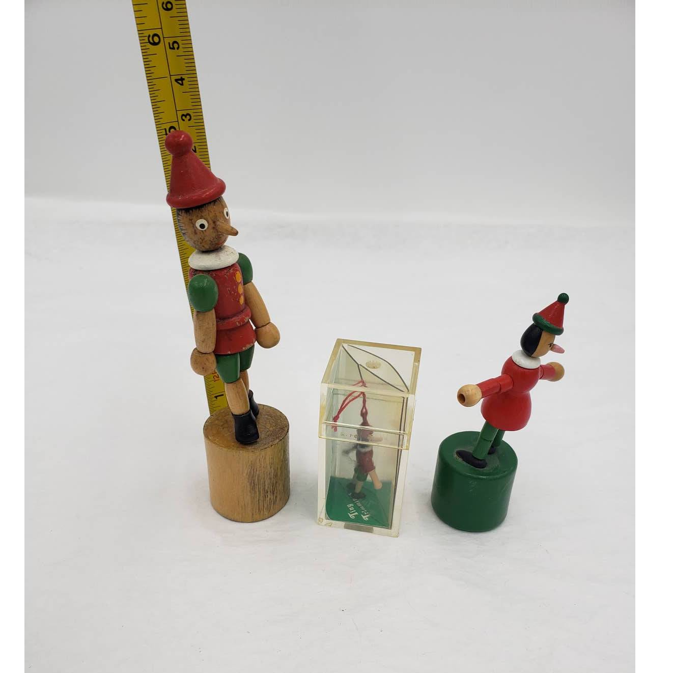 VTG Pinocchio Lot of 3 W/2 Wooden Pinocchio Collapsible Push Thumb and Ornament